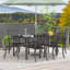 Abriya 6 - Person Steel Patio Dining Set Umbrella Hole Included Rectangular Table