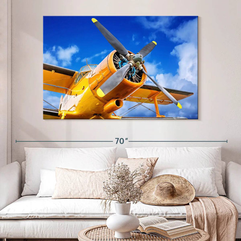 Avion à hélice jaune Mehar, H 34 po x l 51 po