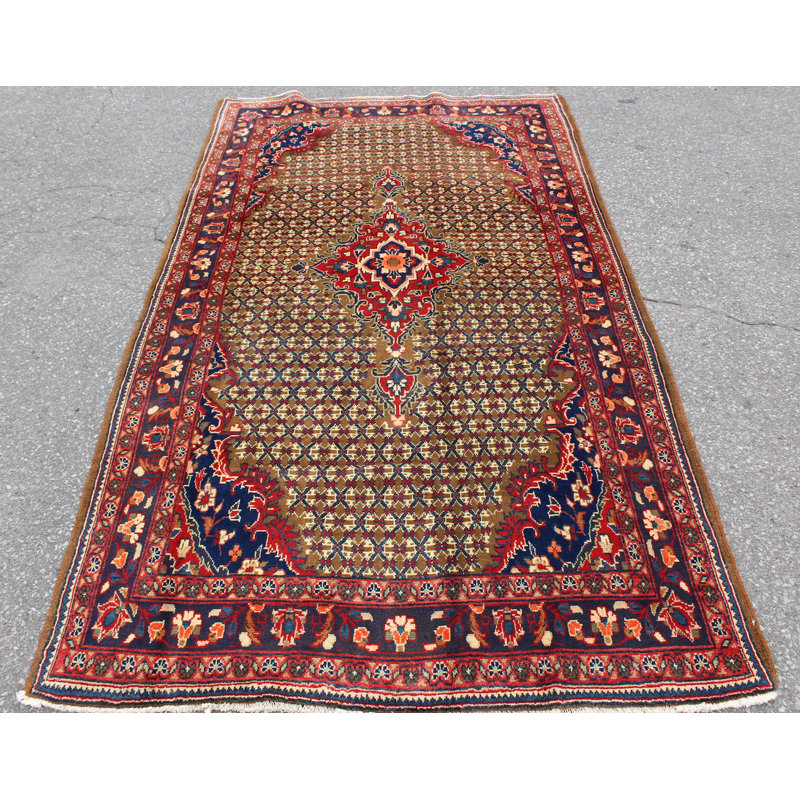 Tapis vert fait à la main avec médaillon rouge