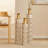 Set Of 3 Tall Metal Floor Vases With Gold Leaf Pattern, Graduated Heights For Balanced Home Decor Display.