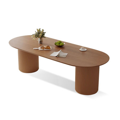 Tables de salle à manger ovales brunes en bois massif