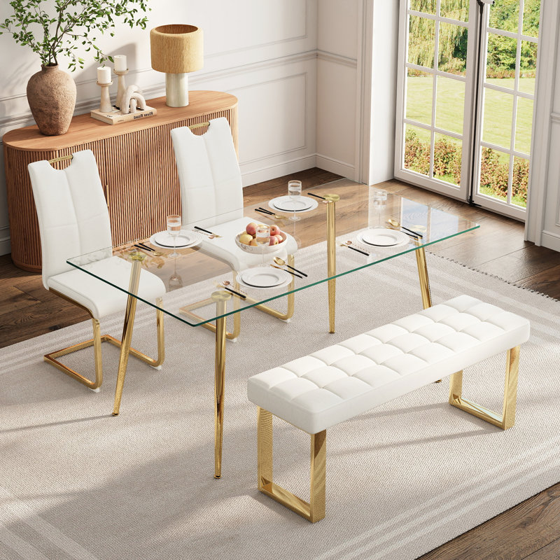 Ensemble de salle à manger en verre pour 4 à 6 personnes, de style moderne, comprenant une table de cuisine rectangulaire en verre, des chaises rembourrées en similicuir et un banc.
