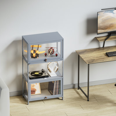 Vitrine sur pied moderne à 3 niveaux avec porte rabattable de 41,7 po Modern, parfaite pour la collection de meubles de salon ou de bureau