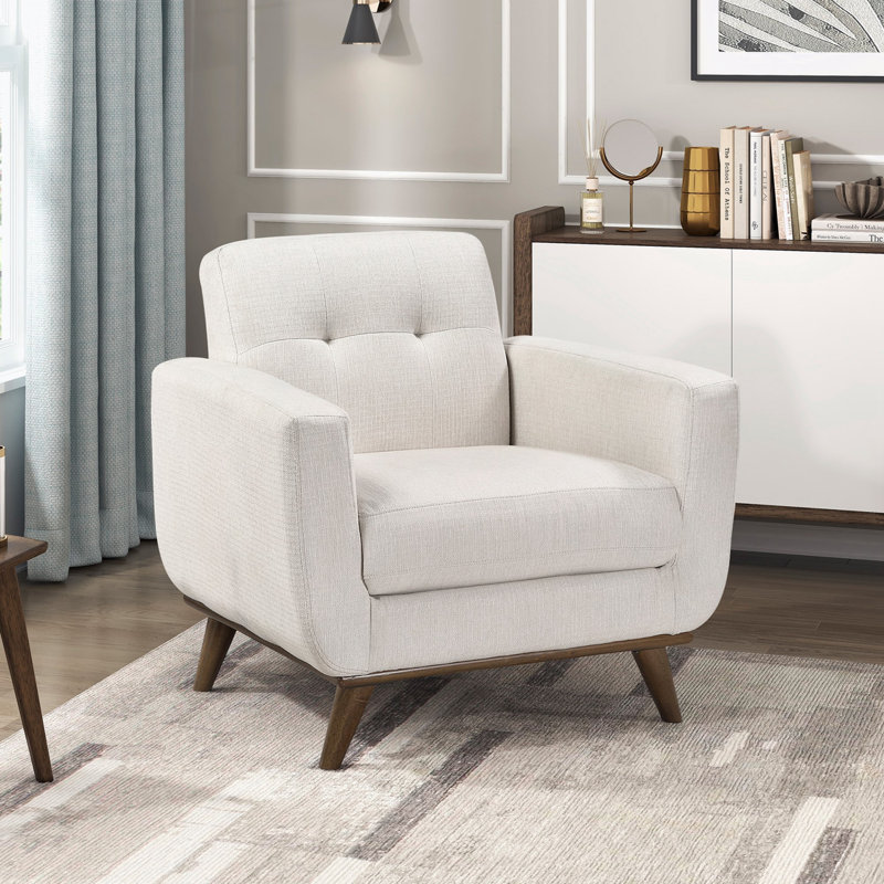 Chaise rembourrée avec dossier capitonné et pieds robustes