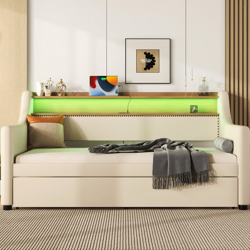 Lit de jour simple avec couchette en beige, cuir PU enduit, station de charge, lumières à DEL et support de tête de lit beige