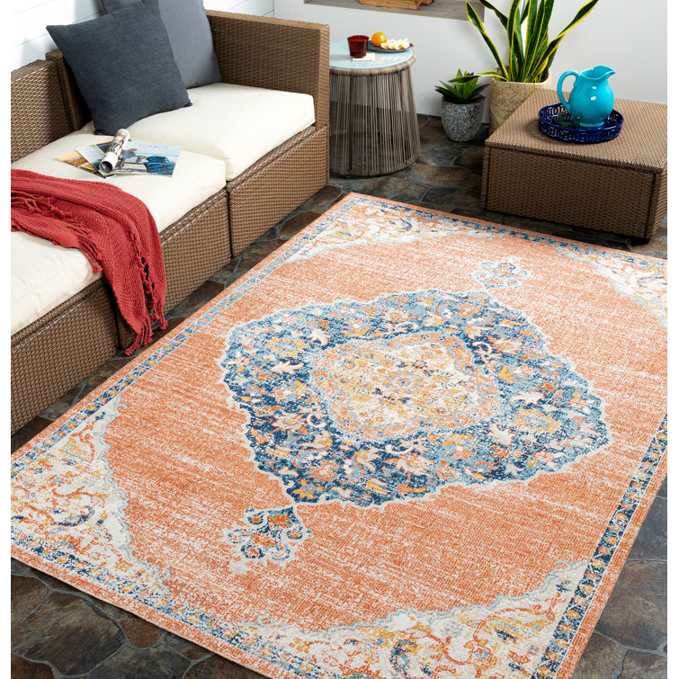 Enciso Oriental Indoor/Outdoor Area Rug in Orange
