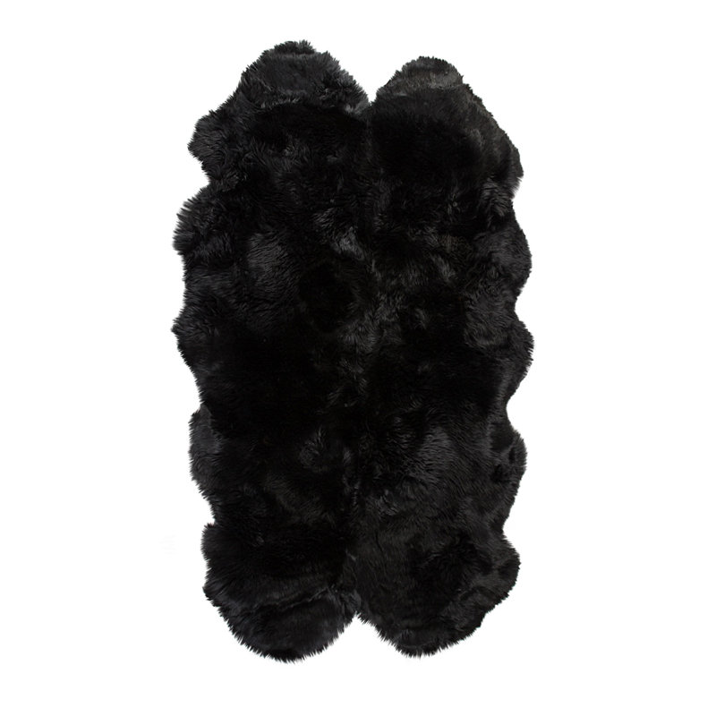 Tapis noir à imprimé animal