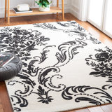 Esjay Hand Tufted Wool/Cotton Floral Rug in Beige/Ivory