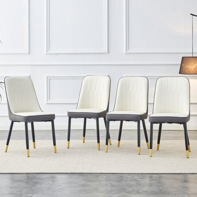 A modern dining chair with a white dark gray dual tone PU leather backrest and black metal legs, suitable for kitchens, bedrooms, and offices. A set of 4 pieces (white+dark gray+PU)