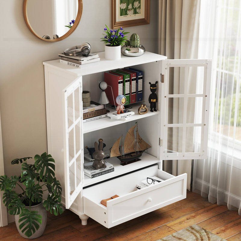 Buffet minimaliste blanc avec portes doubles en verre et tiroir