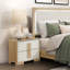 Table de chevet de rangement contemporaine à 2 tiroirs avec finition en mélamine durable, parfaite pour les chambres à coucher modernes et l'organisation efficace.