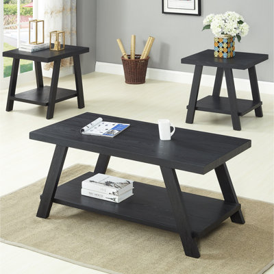 Table basse contemporaine en bois à finition noire avec tablette et pieds élégants à angle large pour un rangement supplémentaire en noir, offrant des qualités de pieds supplémentaires