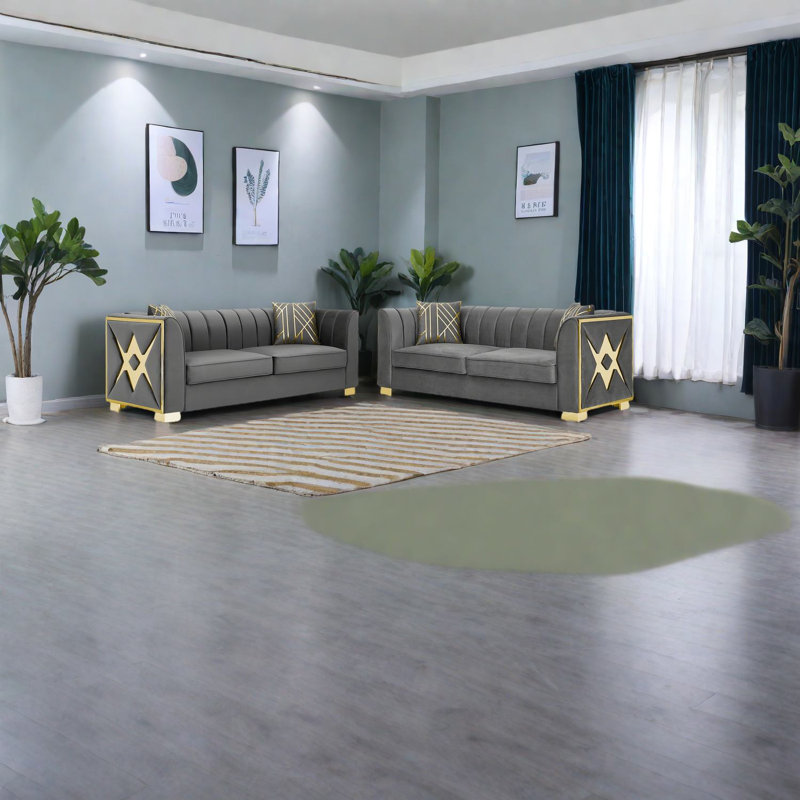 Canapés luxueux en velours gris avec accents dorés pour un salon élégant
