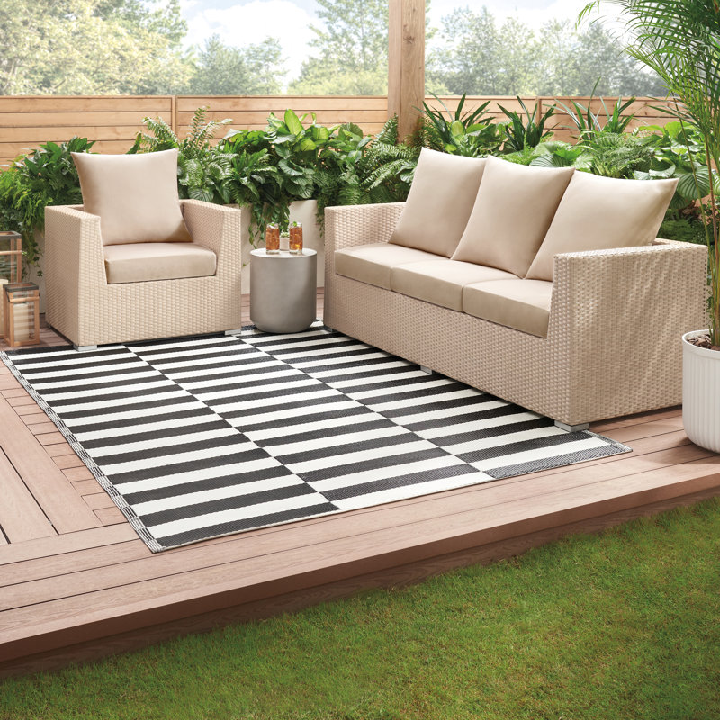 Black and White Reversible Synthetic 6' x 9' Outdoor Rug