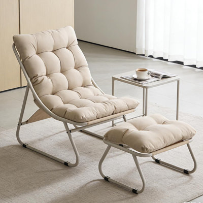 Chaise longue d'extérieur avec repose-pieds et coussins
