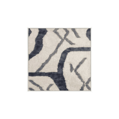Tapis beige lavable à la machine