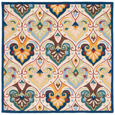Tapis floral beige / bleu en laine / coton touffeté à la main Metro