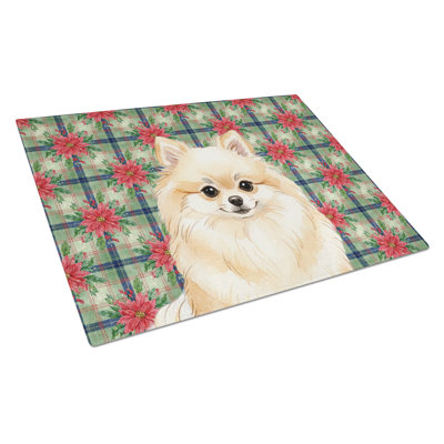 Cream Pomeranian Christmas PoinsettIas Glass Cutting Board