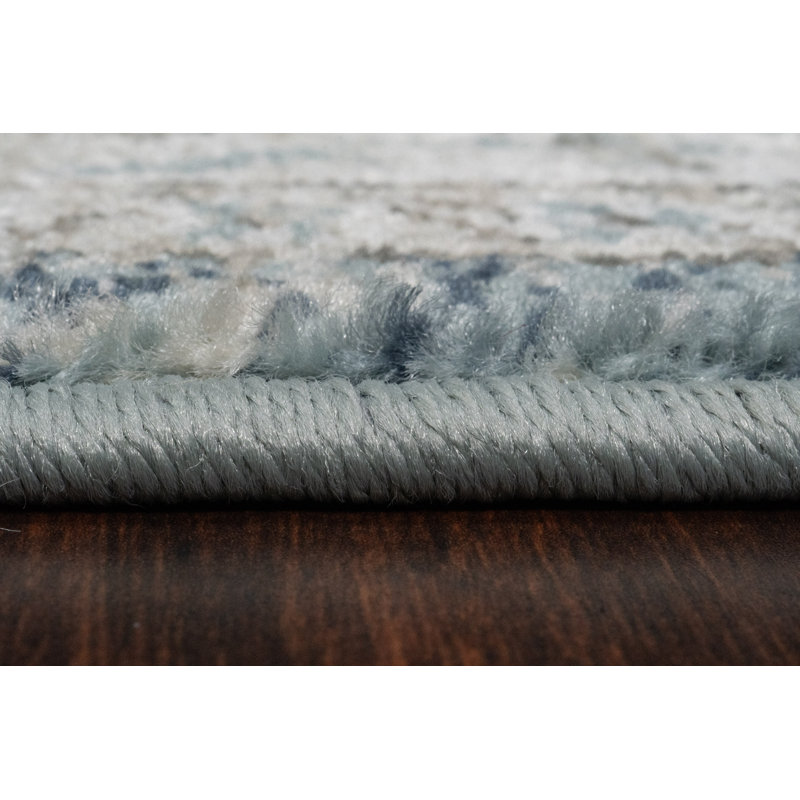 Tapis bleu clair Omarion Southwestern, Rectangle 6 pi 7 po x 9 pi 2 po