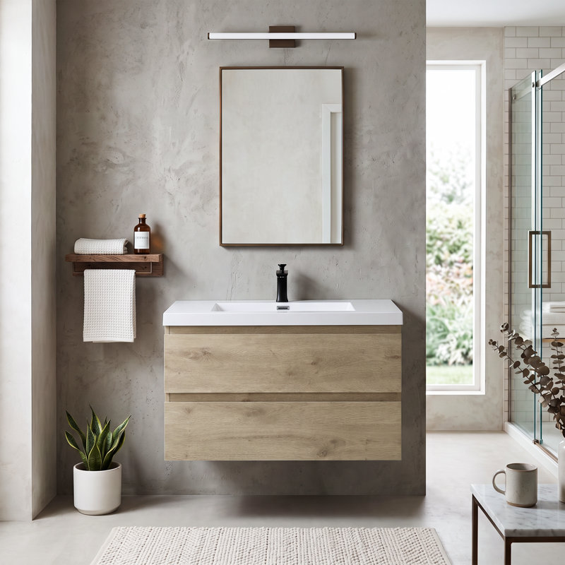 Meuble-lavabo suspendu en mélamine de bois de 35,43 po avec portes à fermeture amortie et lavabo intégré en résine, entièrement assemblé.