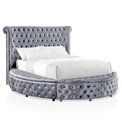 King Size Bed In Round Shape With Gray Velvet - Like Upholstery, Button Detailing, And Storage Featuring Rail