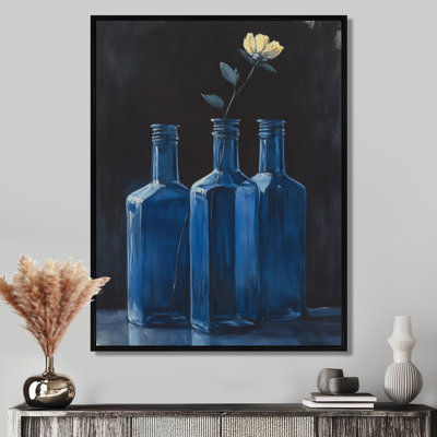 Bottles in Deep Blue - Still Life Framed Canvas Print
