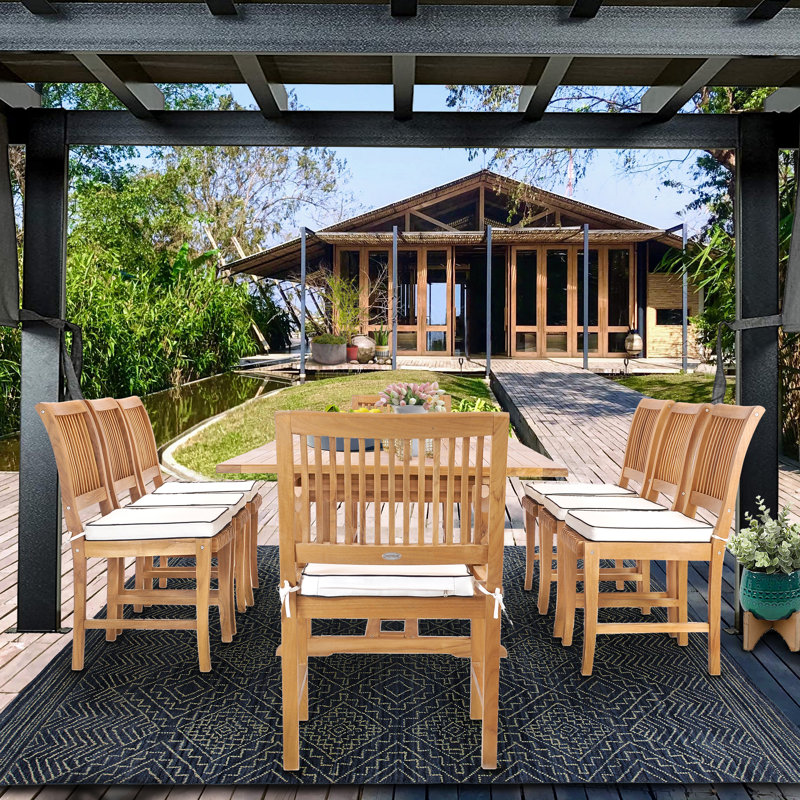 Anquinetta Outdoor 9 - Piece Teak Dining Set with Cushions