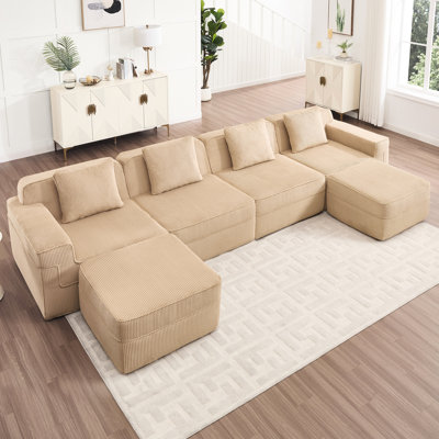 Canapé d'angle modulaire 4 places Cloud sans ossature en velours côtelé camel, coussins décoratifs, 2 poufs amovibles, aucun assemblage requis pour des moments de détente en famille. Velours côtelé - Forme en U avec un confort similaire.