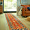 Vrishin Southwestern Area Rug in Rust