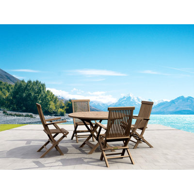 Grimbert 4 - Person Teak Wood Patio Dining Set with Round Table