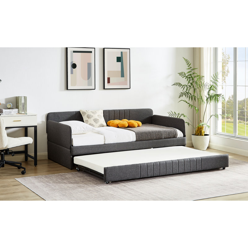 Lit de jour gris simple avec lit gigogne et structure en fer pour une chambre à coucher élégante et pratique