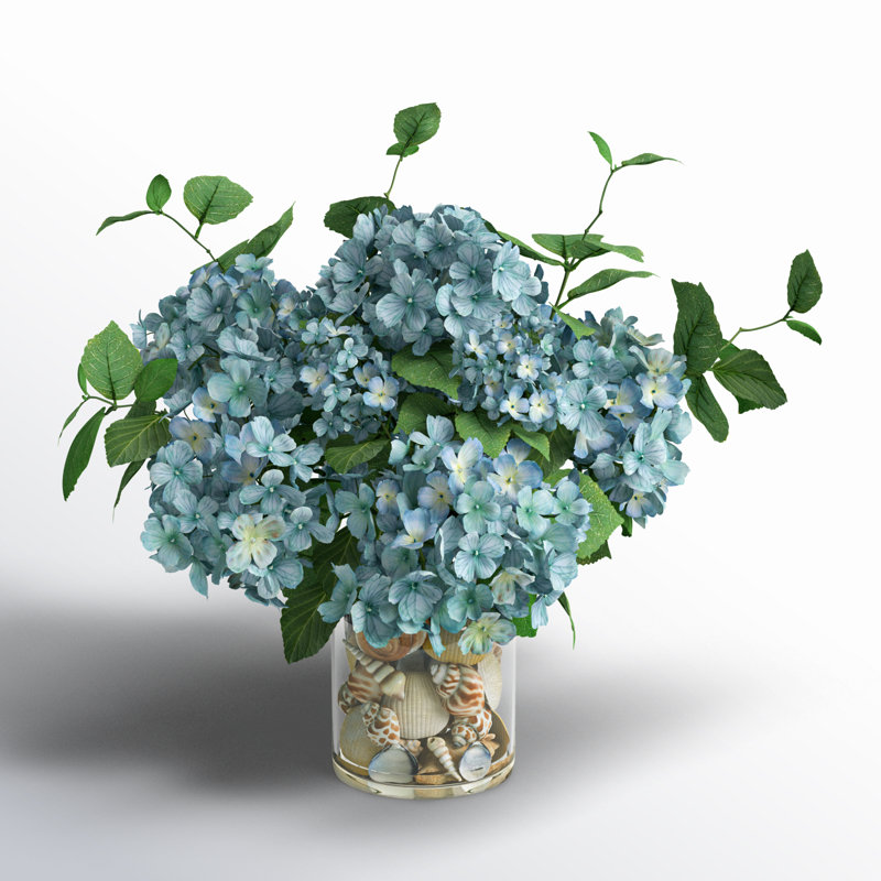 Hydrangeas Arranged in Glass Vase with Shells, Blue/Beige