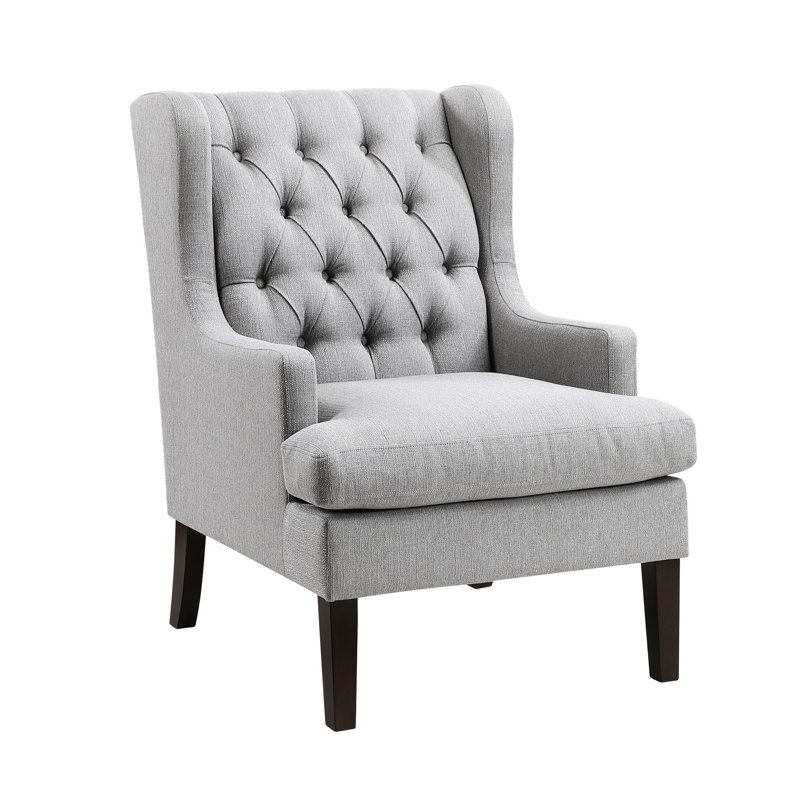 Chaise rembourrée grise avec coussin en mousse et tissu texturé pour un usage domestique