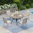 Ensemble de salle à manger de patio pour 4 personnes avec chaises empilables PVC-coated polyester