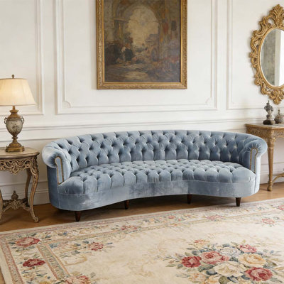 Canapé luxueux en velours capitonné