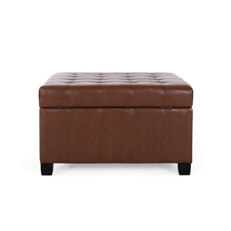 Rangement en similicuir brun avec capitonnage chic et fonction pour le salon