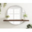 Miroir rond rose avec tablettes