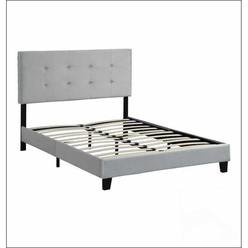 Structure de lit plateforme tapissier avec tête de lit capitonnée tirant, combinant style et confort pour une expérience de chambre à coucher luxueuse