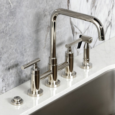 Kingston Brass Manhattan Two-Handle 4-Hole Deck Mount Bridge Kitchen Faucet With Brass Sprayer