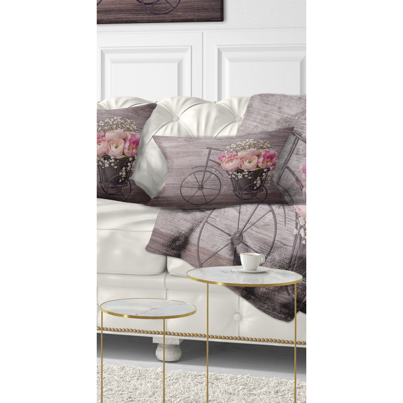 Coussin lombaire à fleurs florales sur bicyclette renoncule
