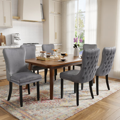 Ensemble de 2 chaises de salle à manger en velours capitonné à oreilles cloutées