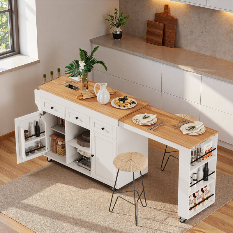Îlot de cuisine roulant avec table de salle à manger extensible, station de charge, support de rangement ouvert à trois niveaux, 3 tiroirs et 2 armoires de rangement