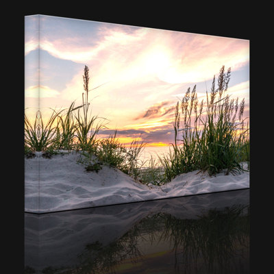 Grass On The Beach At Sunset by No - Wrapped Canvas Print
