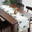 Chemin de table bleu Anner avec broderies et découpes