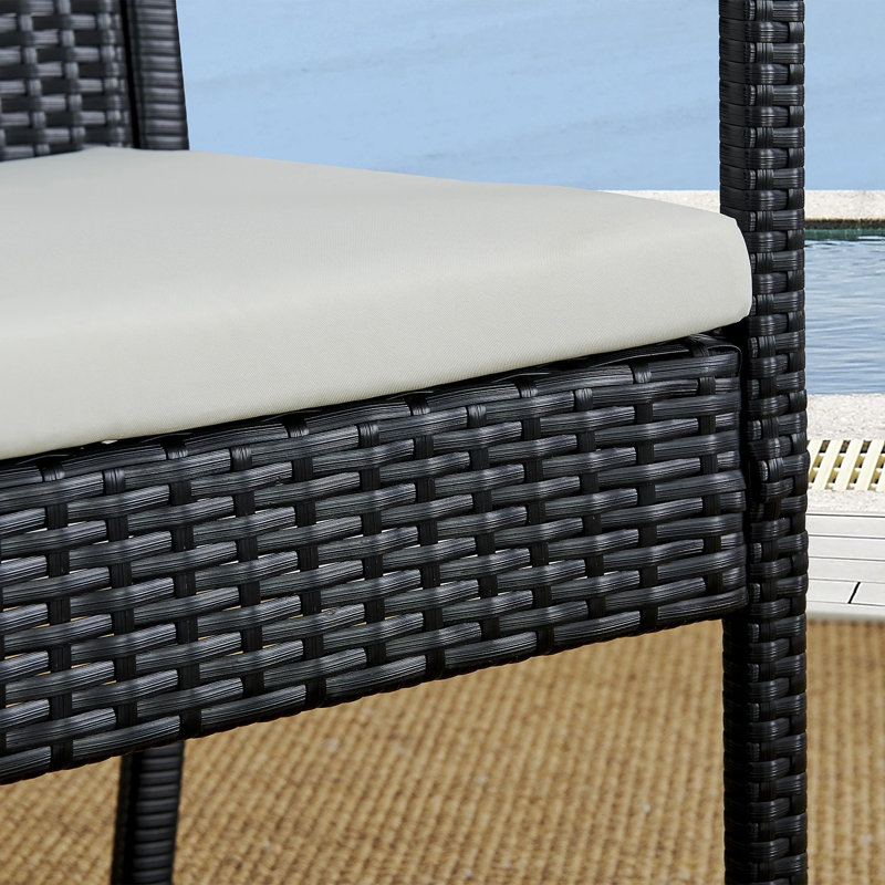 Soffren 4 - Person Wicker Patio Dining Set with Rectangular Table , Cushions Included, Black