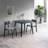 Irregular Shape Dining Table with Solid Rubberwood Construction and Sleek Black Finish Seats 4