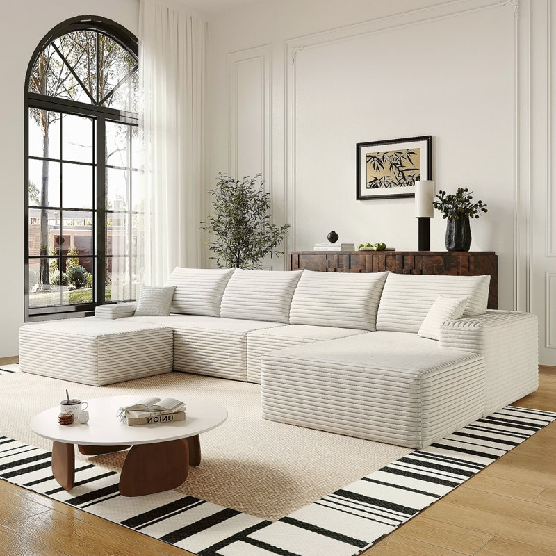 Canapé modulaire 135 po avec 1 repose-pieds Cloud, canapé rembourré minimaliste moderne pour le salon, canapé d'angle à assise profonde, aucun assemblage requis (tissu en velours côtelé moelleux), blanc
