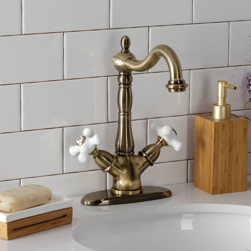 Robinet pour vasque à fixation sur comptoir à deux ou trois trous Kingston Brass Heritage, Laiton rétro