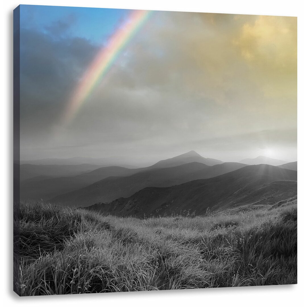 Leinwandbild Wunderschöne Berge mit Regenbogen am Himmel