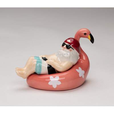 Santa Relaxing On Flamingo Salt And Pepper